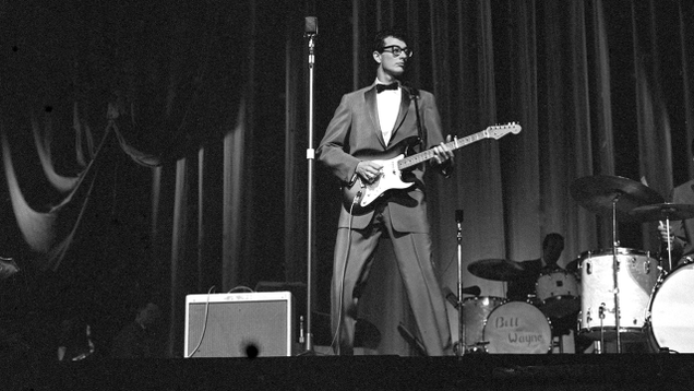 Illustration for article titled Remembering A Legend: 5 Times Buddy Holly Performed In Front Of An Audience Of 2,000 Fortune-Tellers All Screaming At Him To Never Get On An Airplane